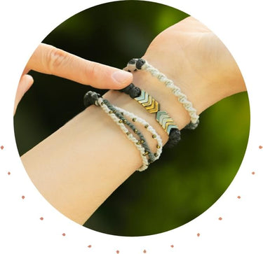 an arm with multiple bracelets